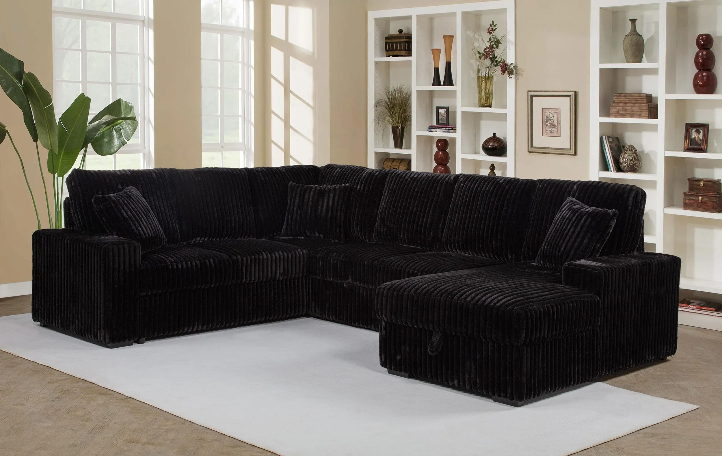 Devonshire Black Sleeper Sectional Sofa Storage Chaise - Image 2