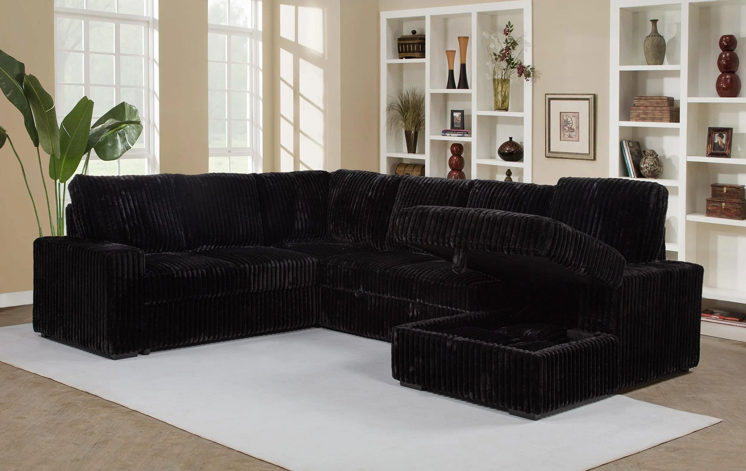 Devonshire Black Sleeper Sectional Sofa Storage Chaise - Image 3