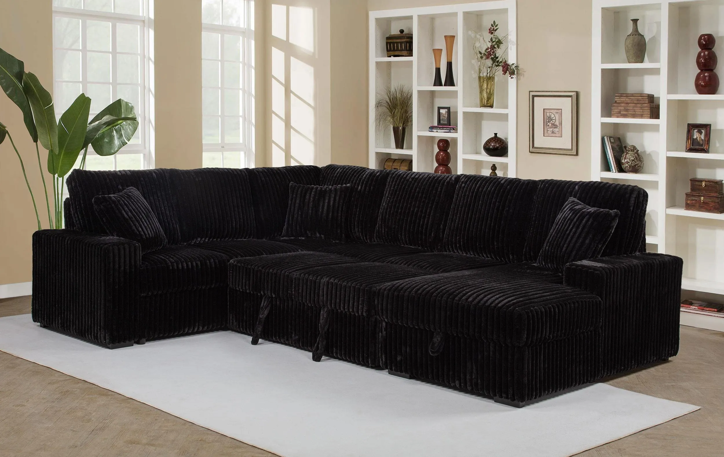 Devonshire Black Sleeper Sectional Sofa Storage Chaise - Image 4